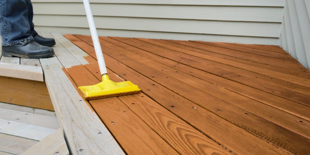 staining deck with mop
