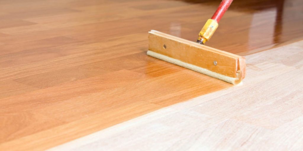 cleaning hardwood floor with mop