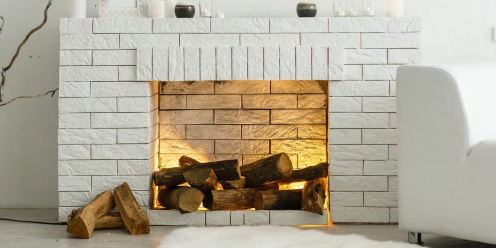 white fireplace burning