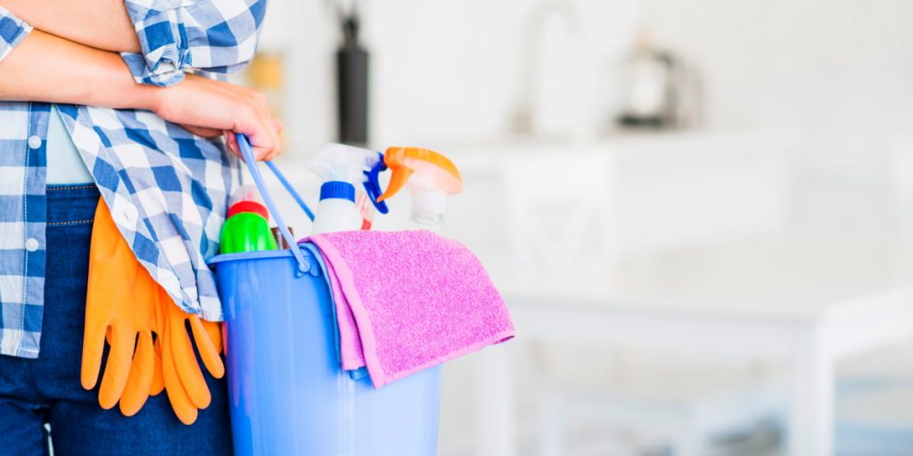 bucket with cleaning supplies