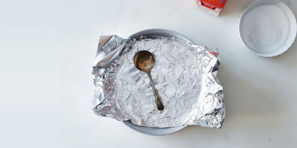 a silver spoon in vinegar
