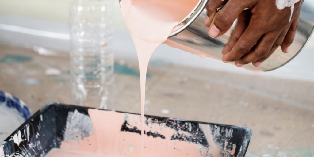 spilling pink water-based paint