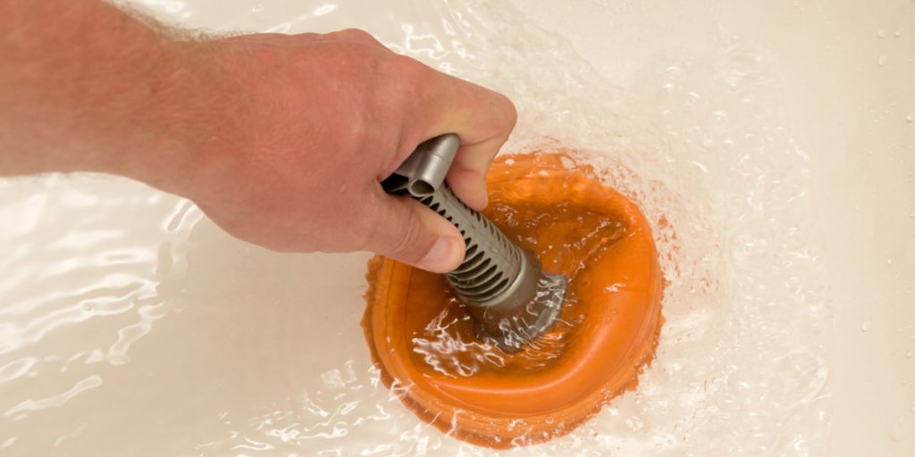 Cleaning A Sink Drain Using Plunger