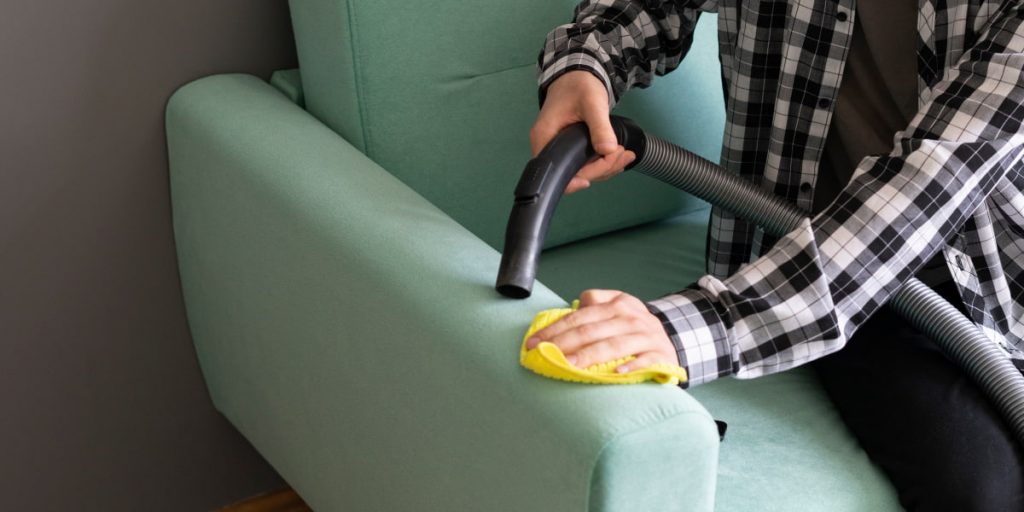 vacuuming suede sofa