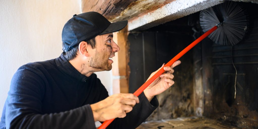 cleaning fireplace from black soot