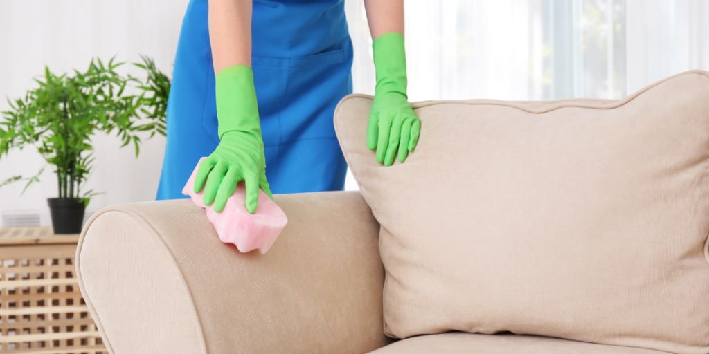 wiping the couch pillows