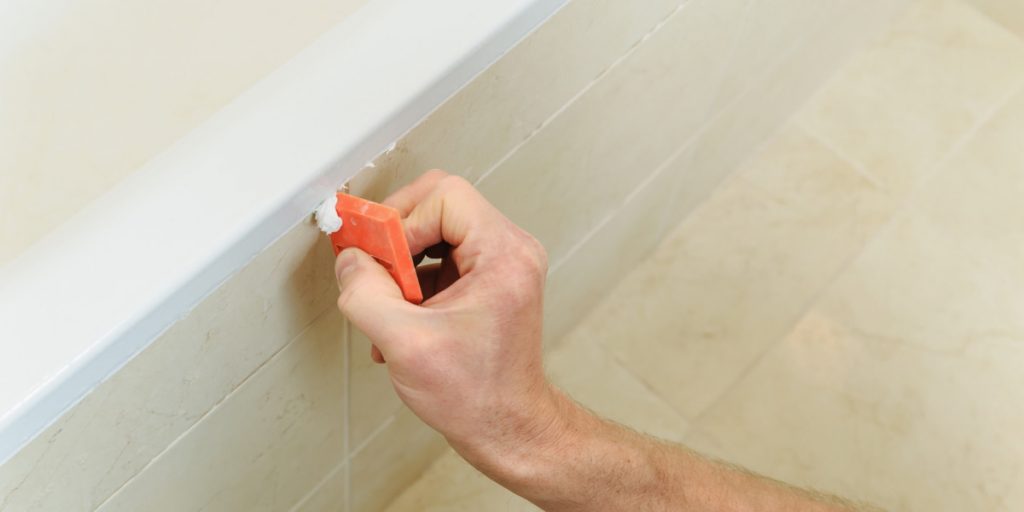 remove caulk from shower