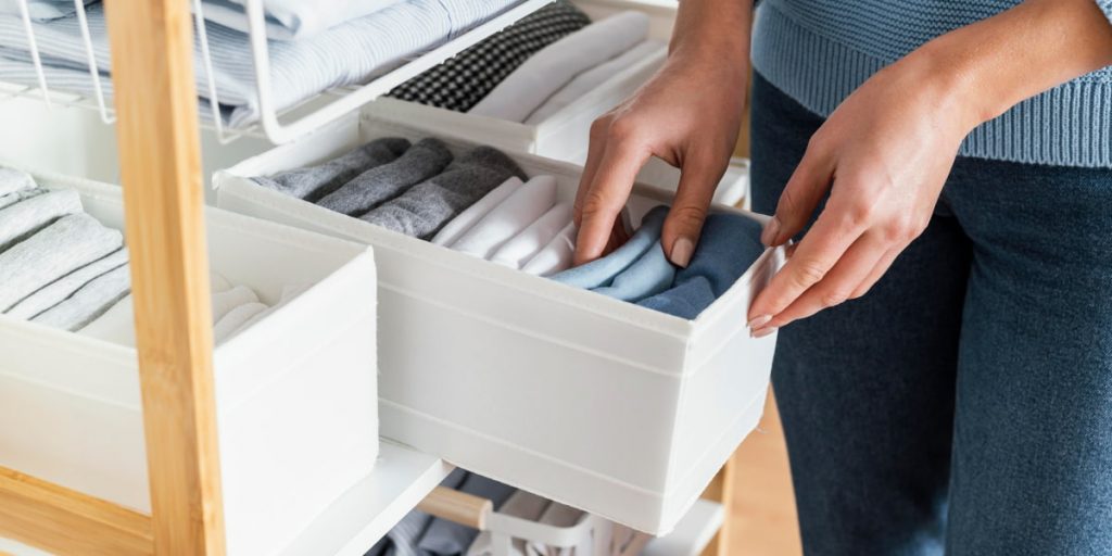 organizing clothes with compartments
