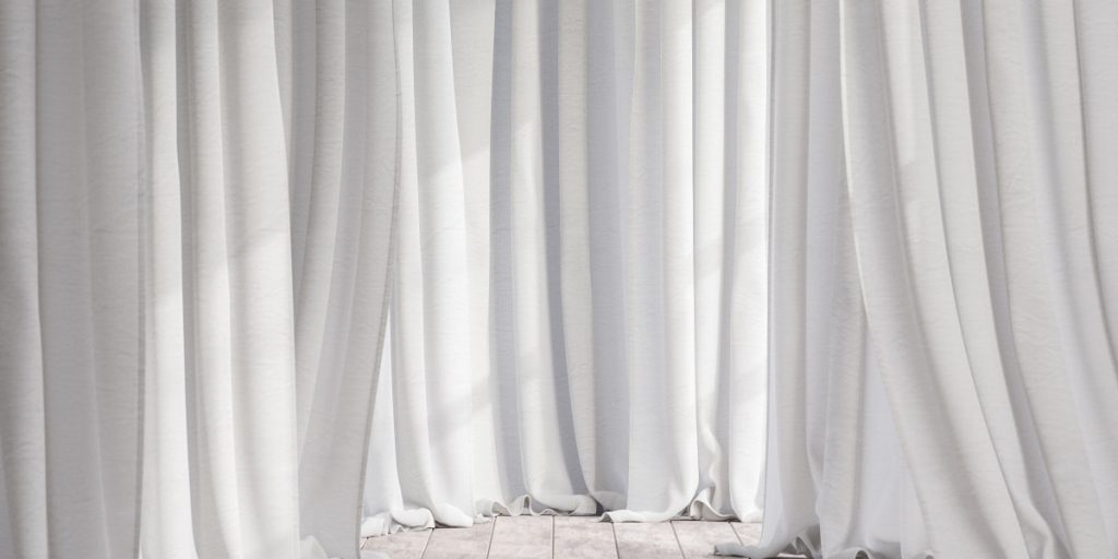 white fabric curtains