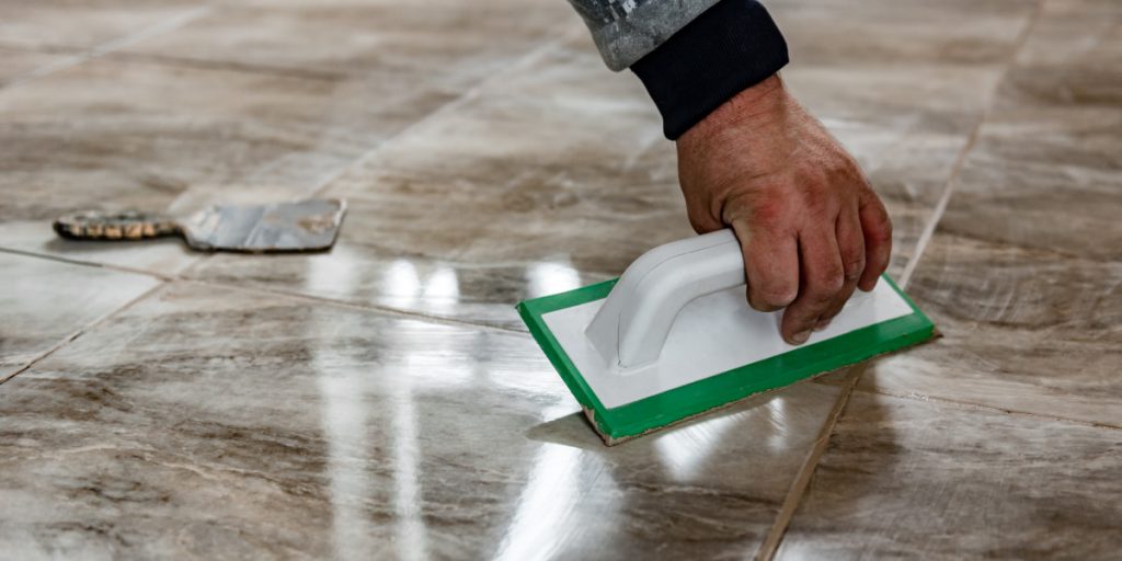 grout sealing by man