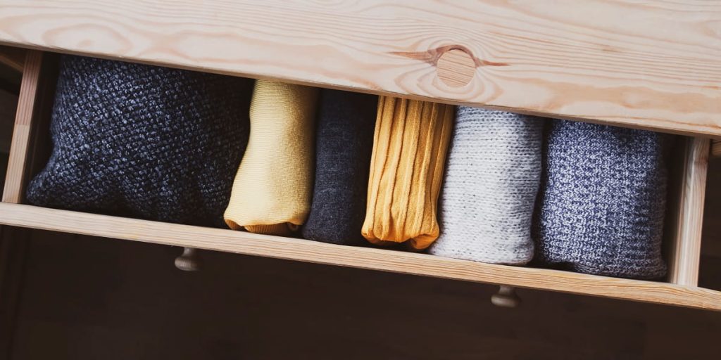 storing sweaters in dresser