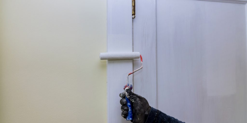 painting wooden trim with a roller